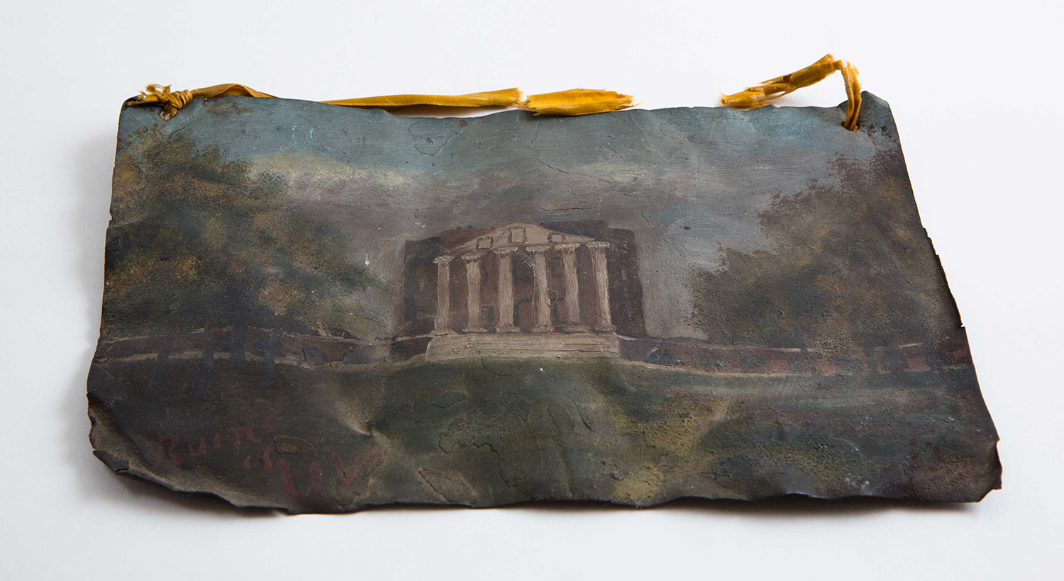 A crumpled painting of UVA's Rotunda with old yellow ribbon strung across the top. 