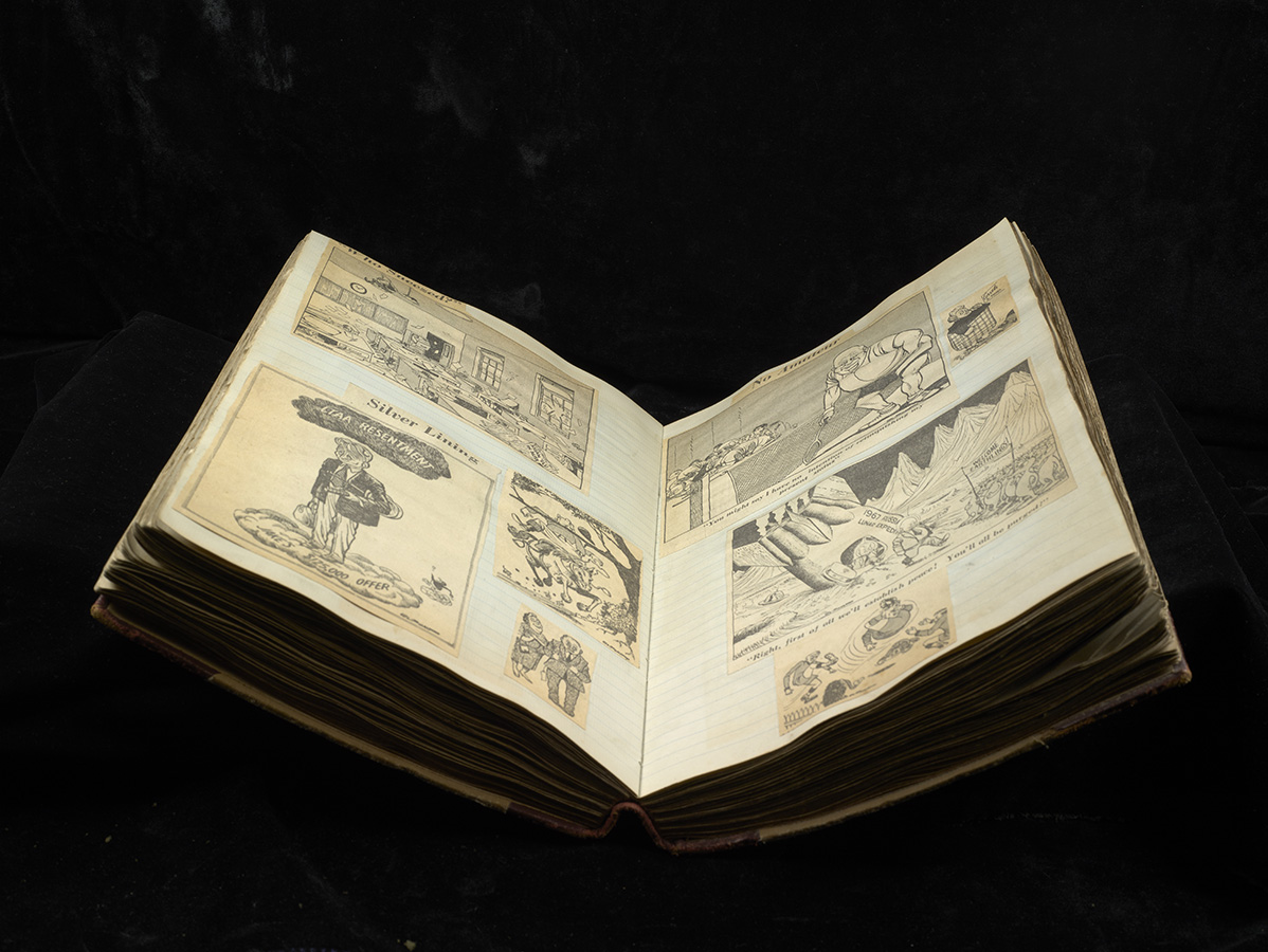 Scrapbook of early Oliphant works compiled by his father, ca. 1952–1964.