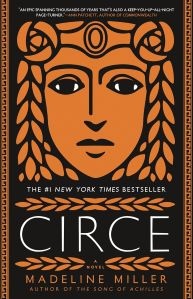 Cover of the book "Circe" by Madeline Miller. The design features a stylized face in ancient Greek artistic style with an orange and black color scheme. Text at the top notes it as a "#1 New York Times Bestseller.