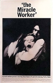 Movie poster for "The Miracle Worker" featuring Anne Bancroft and Patty Duke in an emotional embrace.