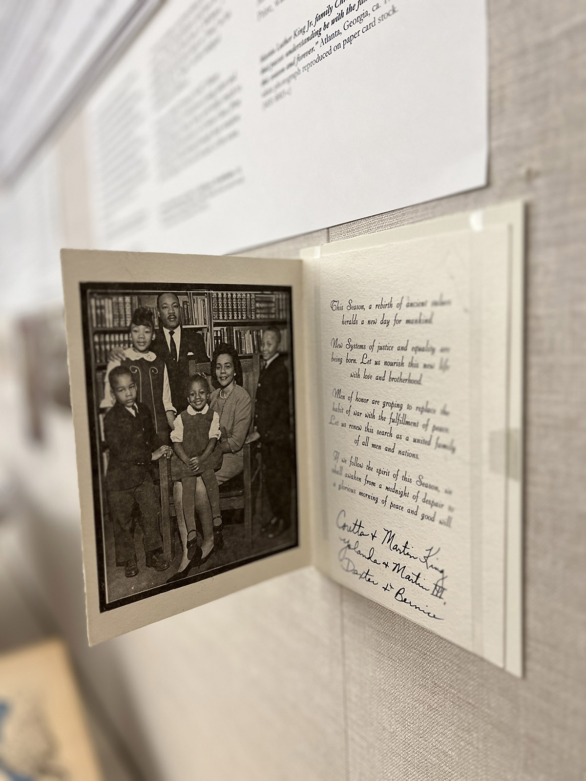 A black-and white Christmas card with a photo of Martin Luther King Jr., his wife Coretta, and children Yolanda, Martin III, Dexter and Bernice.