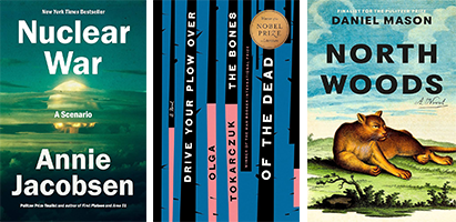 Three book covers side by side: "Nuclear War: A Scenario" by Annie Jacobsen, "Drive Your Plow Over the Bones of the Dead" by Olga Tokarczuk, and "North Woods" by Daniel Mason. Each cover features distinctive artwork and typography.