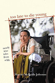 Book cover for "Too Late to Die Young," featuring a color photograph of Harriet McBryde Johnson (a white, smiling woman) sitting in a wheelchair. 
