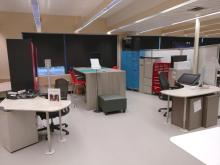 Sitting and standing areas clustered around colorful lockers