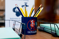 UVA mug filled with pencils
